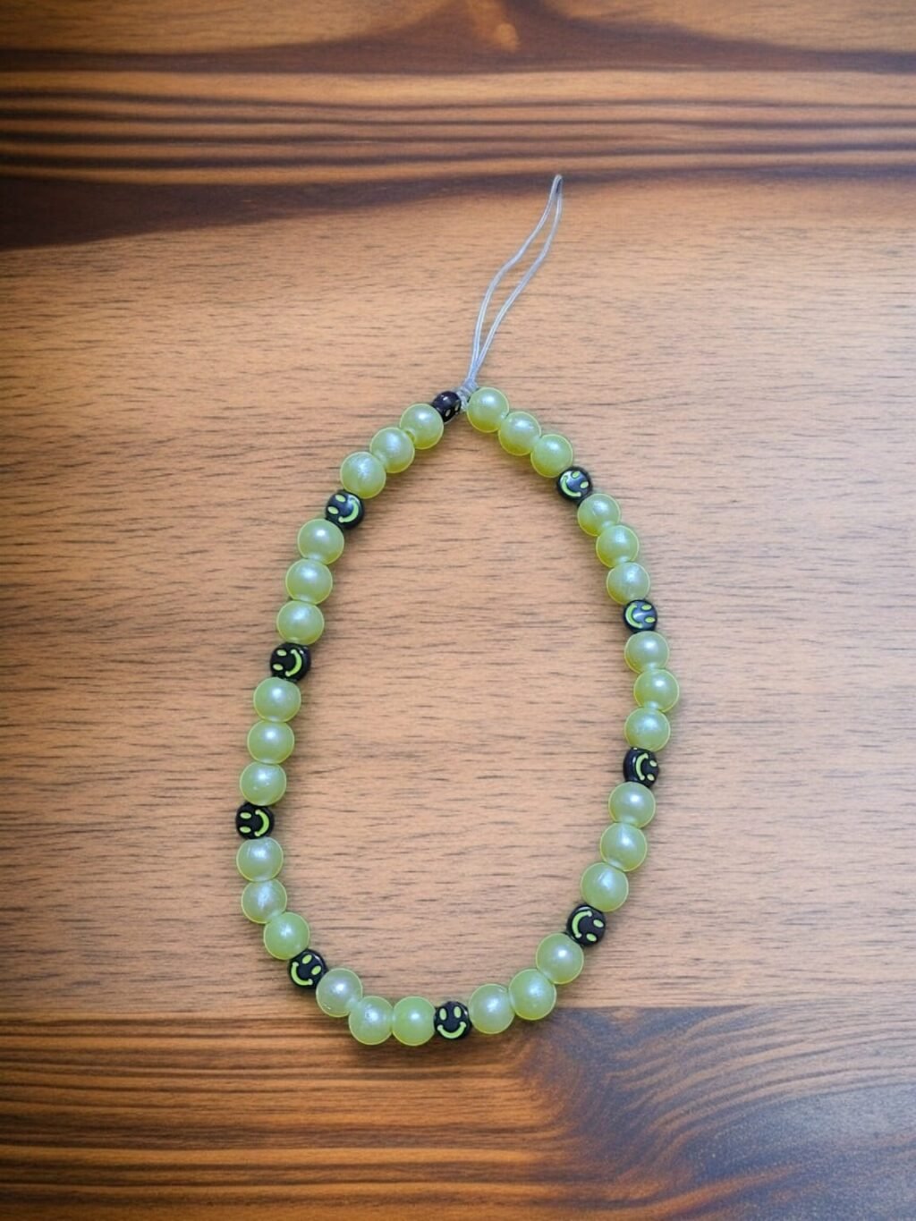 1746817479-WhatsApp20Image202025-05-0820at2010.02.5120PM202.jpeg دلاية موبايل مصنوعه من الخرز