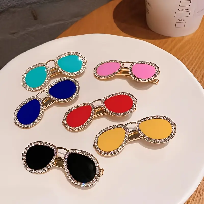 1747161211-34ab2775-9d94-469f-94ef-5ed738b6350e.webp 2قطعة مشبك شعر أنيق جديد بنقشة نظارات الراين للفتيات الجميلات، إكسسوارات مشبك جانبي للأناقة الخارجية