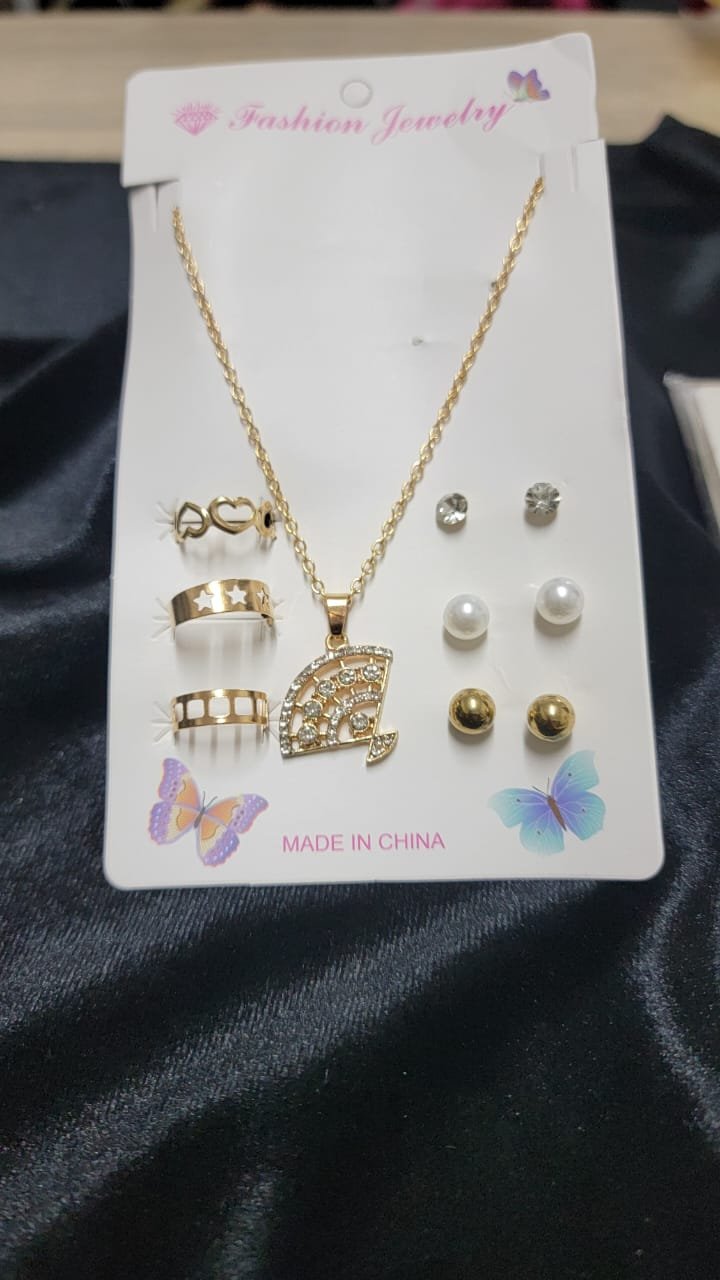 1751306116-WhatsApp20Image202025-06-3020at201.03.3220PM205.jpeg طقم اكسسوارات سلسلة بدلاية مروحة مرصعة بفصوص انيقة +3 خواتم + 3 حلقان