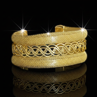 اسورة ذهبية أنيقة عريضة متشابكة مجوفة