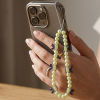 دلاية موبايل من اللؤلؤ الأصفر تجمع بين الأناقة واللطافة