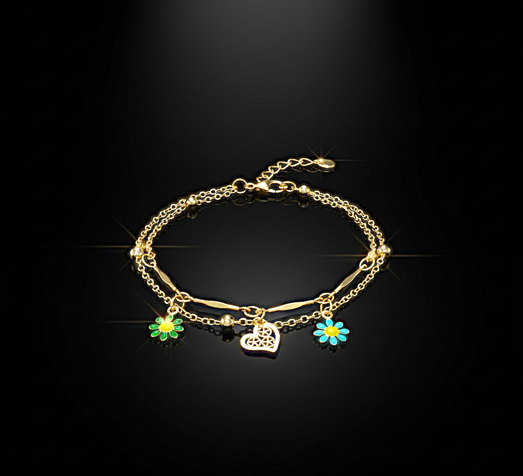 خلخال ذهبي مزدوج بدلايات الورود الملونة والقلب الأنيق . صُمم  ليمنحك شعوراً بالأنوثة والتميز في كل خطوة.