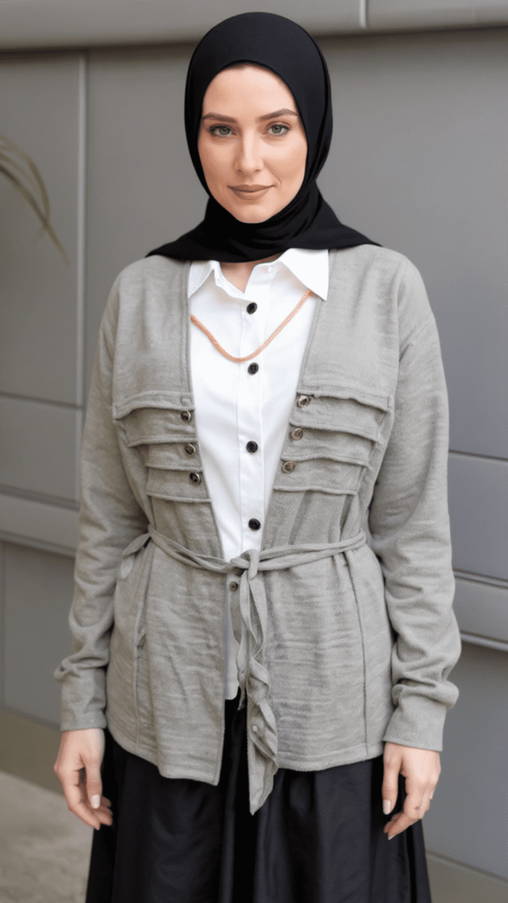 topview_avatar_5036ecf98754498ba77f59df73145948 توينز مكون من قميص أبيض وسترة أنيقة باللون البيج الغامق مظهراً أنيقاً وعصرياً