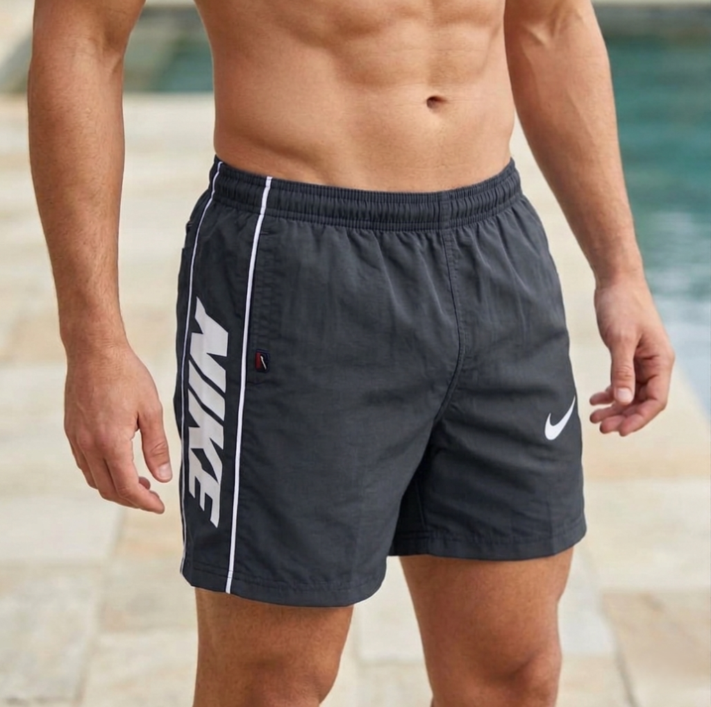 شورت سباحة سادة للرجال فوق الركبة للرجال 2جيب يغلق بسوستة على كل جانب وجيب خلفي