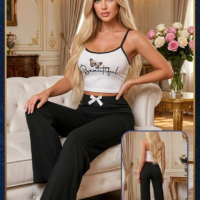 Gemini_Generated_Image_bg7c9jbg7c9jbg7c-1-1.png بيجاما نسائية صيفية أنيقة - طقم ملابس نوم قطعتين (توب كروب أبيض وبنطلون مضلع بفيونكة)